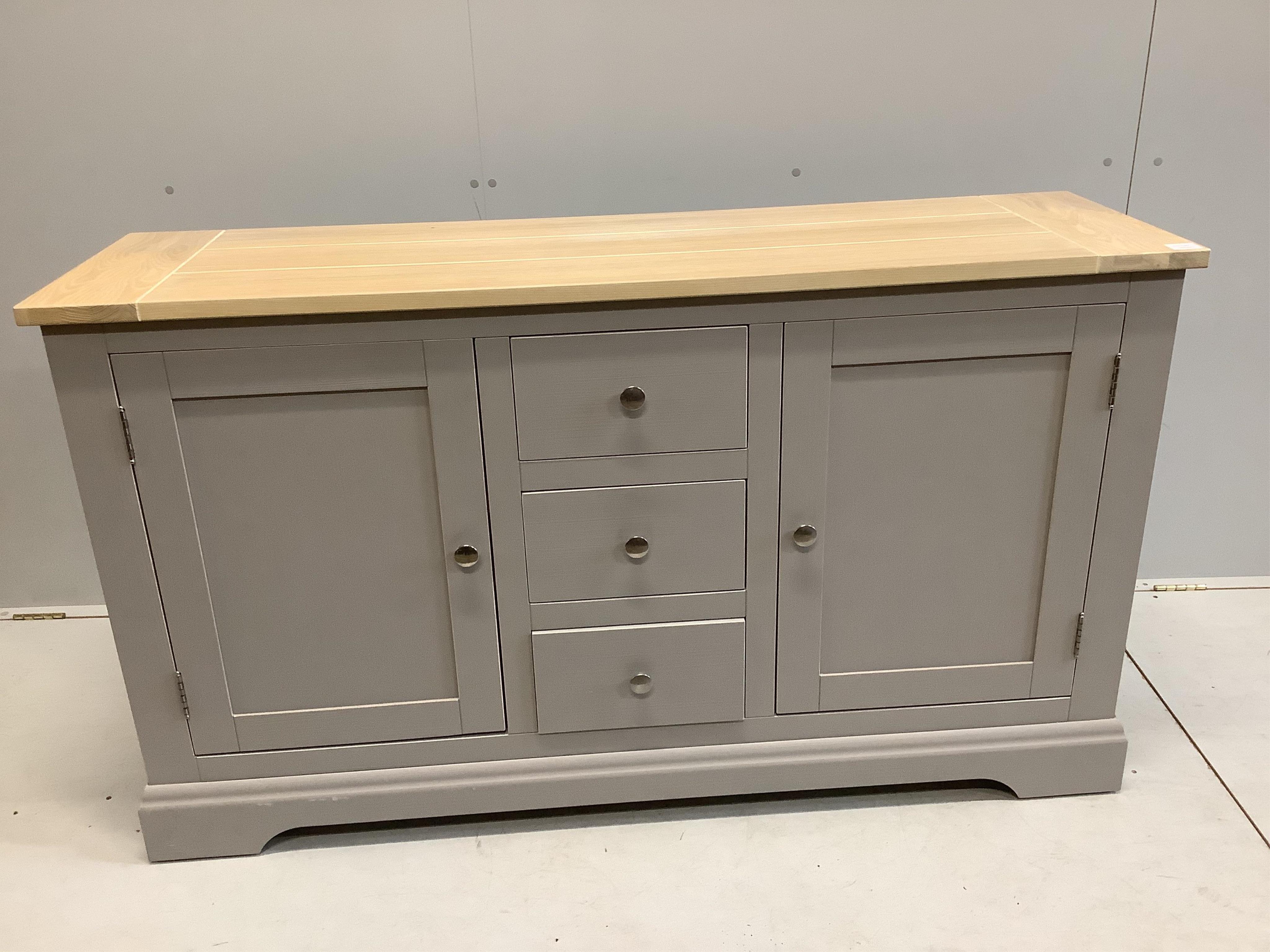 A Laura Ashley 'Dorset Furniture' painted sideboard, width 153cm, depth 45cm, height 89cm. Condition - good